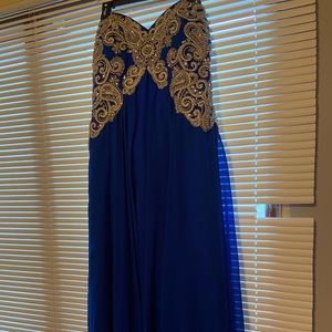 Royal blue A-line, fully beaded bodice, floor length prom dress.